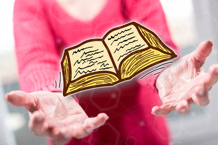 Education concept above the hands of a woman in backgroundの写真素材