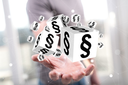 Law concept above the hand of a man in backgroundの写真素材