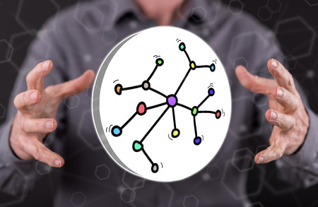 Network concept between hands of a man in backgroundの写真素材