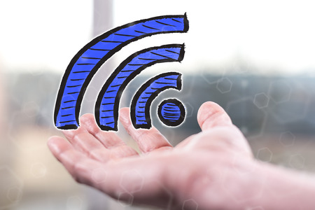 Wifi concept above a hand of a man