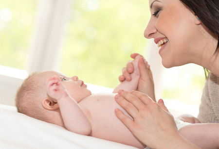 Happy mother with her cute little babyの写真素材