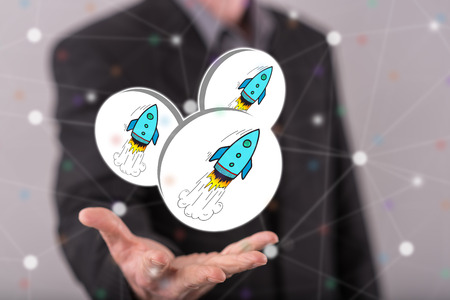 Start up concept above the hand of a man in background