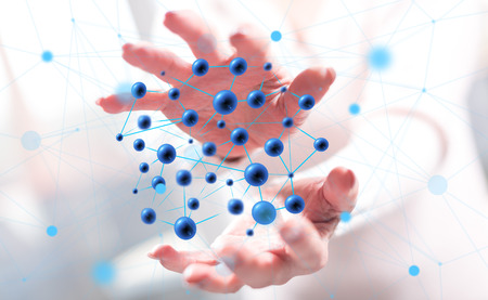 Network concept between hands of a woman in backgroundの写真素材