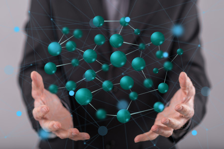 Network concept above the hands of a man in background
