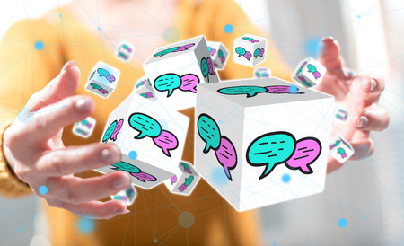 Communication concept between hands of a woman in backgroundの写真素材