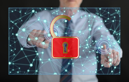 Man touching a network security concept on a touch screen with his fingers