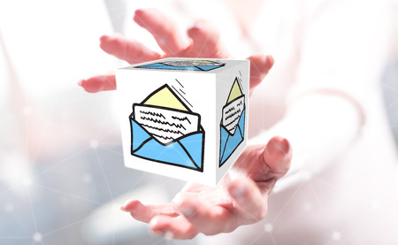 Message concept between hands of a woman in backgroundの写真素材