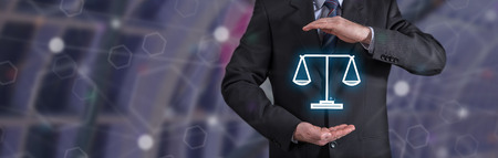 Legal protection concept with businessman in a protective gesture