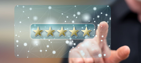 Man touching a customer review concept on a touch screen with his finger