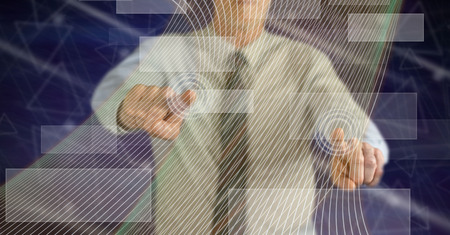 Man touching a virtual technology concept on a touch screen with his fingersの写真素材