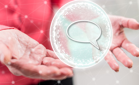 Global communication concept above the hands of a woman in backgroundの写真素材