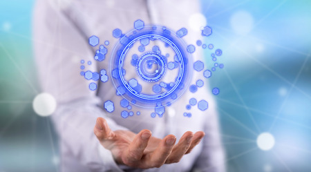 Digital technology concept above the hand of a man in background