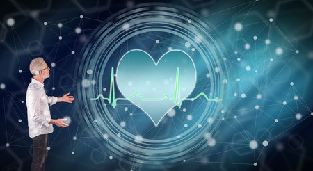 Businessman showing a corporate financial checkup concept on a wall screenの写真素材