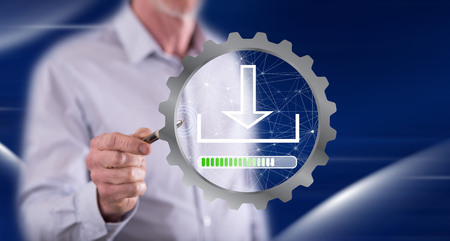 Man touching a download concept on a touch screen with a pen