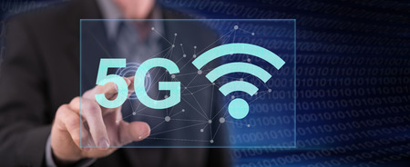 Man touching a 5g concept on a touch screen with his finger