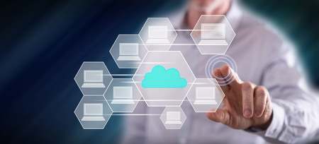 Man touching a cloud computing concept on a touch screen with his finger