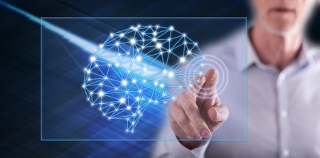 Man touching an intelligence concept on a touch screen with his finger