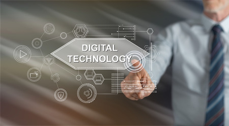 Man touching a digital technology concept on a touch screen with his fingerの写真素材