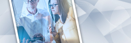 Young businesswoman and senior businessman working together at office, double exposure. panoramic bannerの写真素材