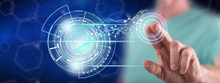 Man touching a technology concept on a touch screen with his finger