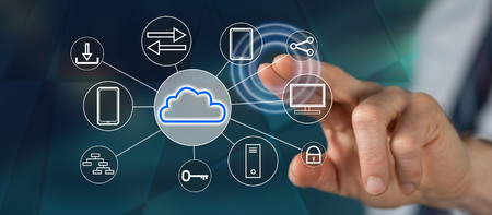 Man touching a cloud computing concept on a touch screen with his finger