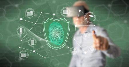 Man with vr headset touching a data security concept on a touch screen with his finger