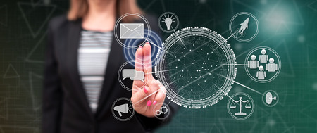 Woman touching a business networking concept on a touch screen with her fingers