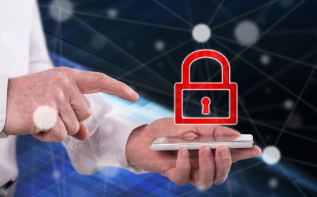 Cyber security concept above a smartphone held by a man