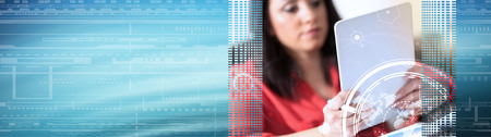 Young attractive businesswoman using a tablet at office with network effect. panoramic banner