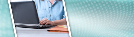 Businesswoman using a laptop in office. panoramic banner