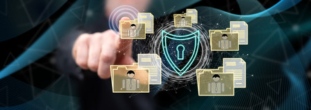 Man touching a personal data security concept on a touch screen with his finger