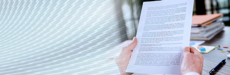 Checking a document in office. panoramic banner