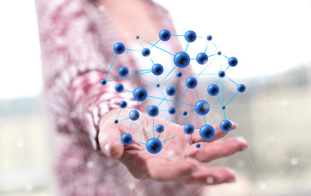 Network concept above the hand of a woman in backgroundの写真素材