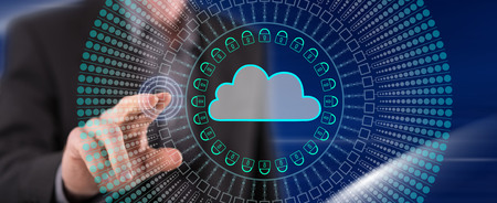 Man touching a cloud networking concept on a touch screen with his finger