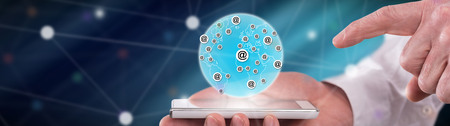 Global communication concept above a smartphone held by a man