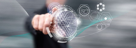 Man touching a virtual technology concept on a touch screen with his finger