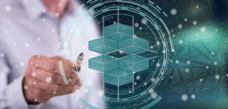 Man touching a blockchain concept on a touch screen with a pen