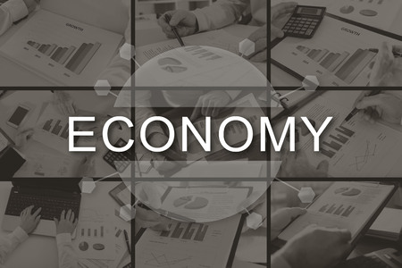 Economy concept illustrated by pictures on backgroundの写真素材