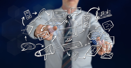 Man touching a communication concept on a touch screen with his fingersの写真素材