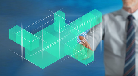 Man touching a blockchain technology concept on a touch screen with his fingerの写真素材