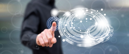 Man touching a virtual technology concept on a touch screen with his finger
