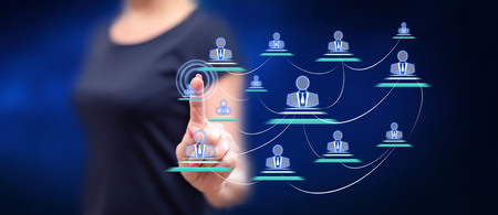 Woman touching a businesssocial network on a touch screen with her finger