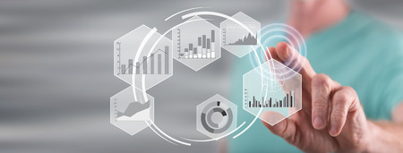 Man touching a data analysis concept on a touch screen with his finger