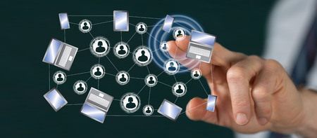 Man touching a social network connection concept on a touch screen with his fingerの写真素材