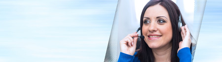 Smiling pretty woman using an headset. panoramic banner