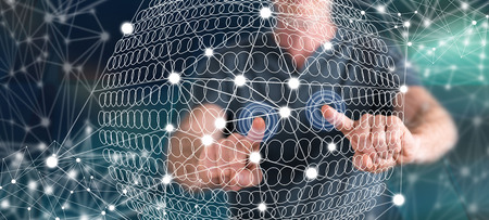 Man touching a global connection concept on a touch screen with his fingers