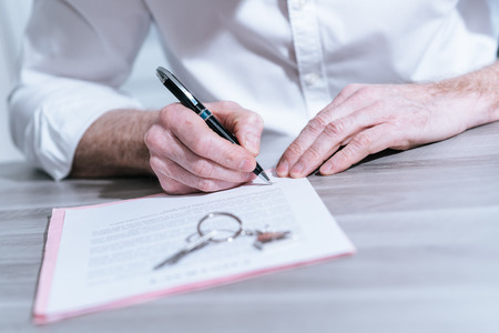 Signature of a real estate contract (Lorem ipsum text used)