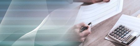 Hands of accountant checking financial document. panoramic banner