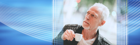 Portrait of mature man drinking coffee outdoors. panoramic banner