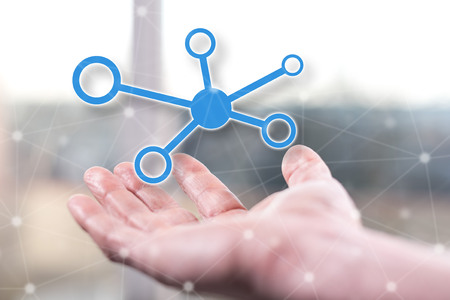 Network concept above a hand of a manの写真素材